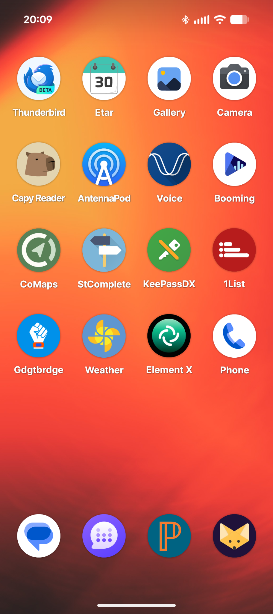 A screenshot of an Android phone homescreen, with a red and black background and an assortment of free and open source apps, which are described in detail below