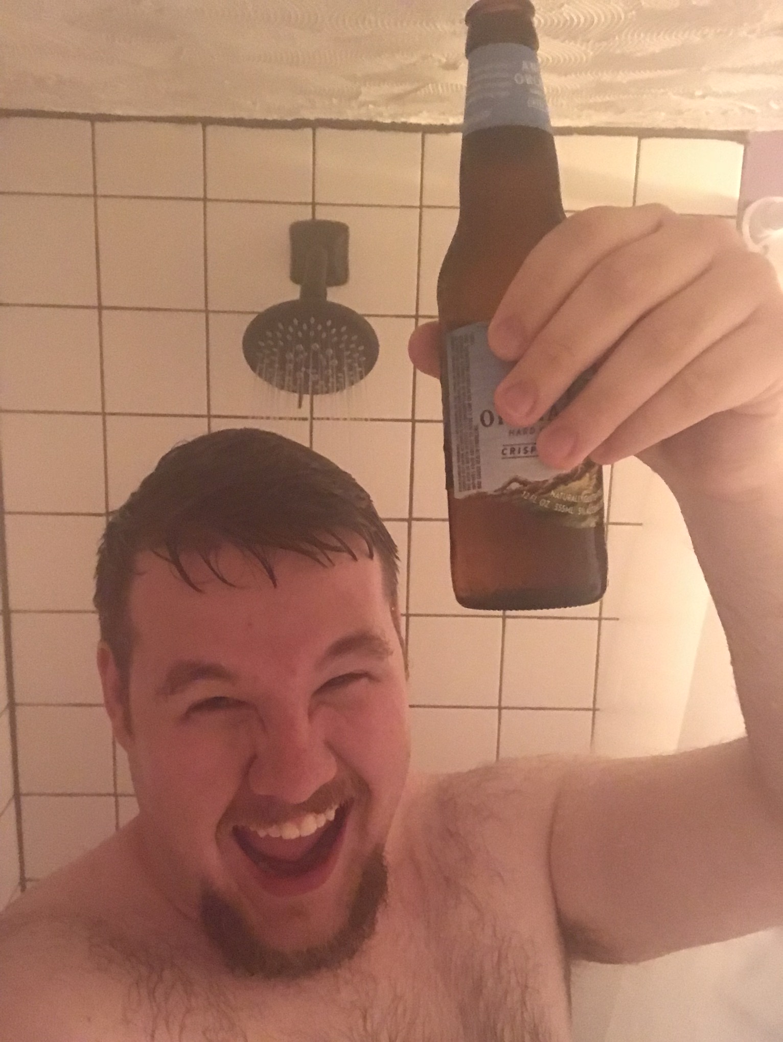 Enjoying a beverage in the shower