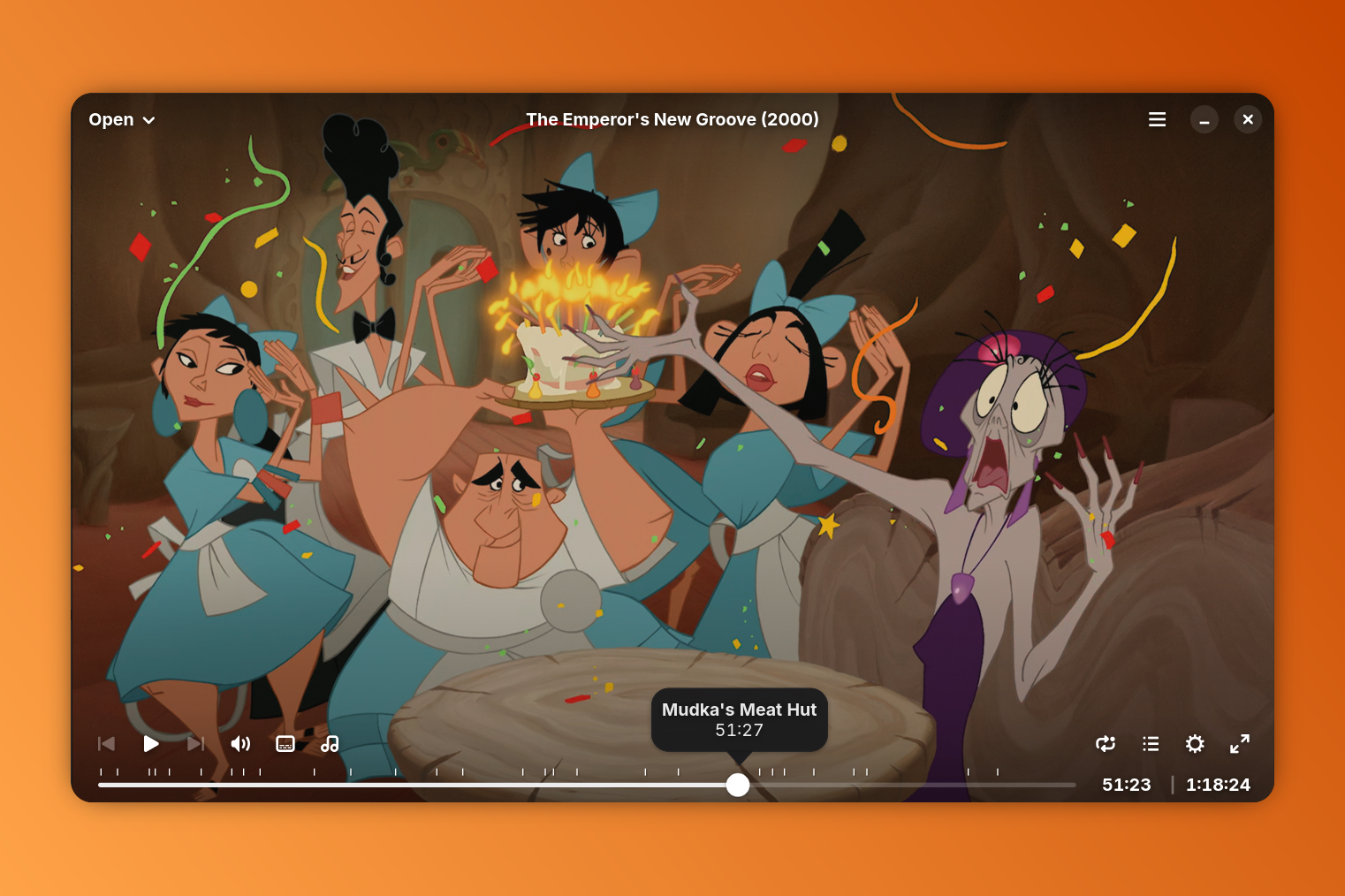 A screenshot of the Cine app with a 4K copy of The Emperor's New Groove playing, highlighting features like chapters and floating controls